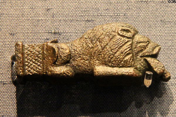 Knife handle, Roman era, in form of lion eating its prey at Corinium Museum. Cirencester, England.