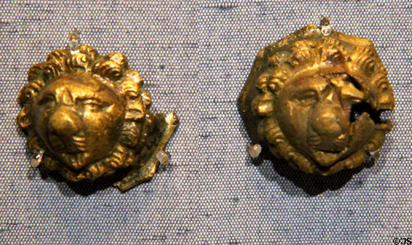 Furniture mounts, Roman era, in the form of lions' heads at Corinium Museum. Cirencester, England.