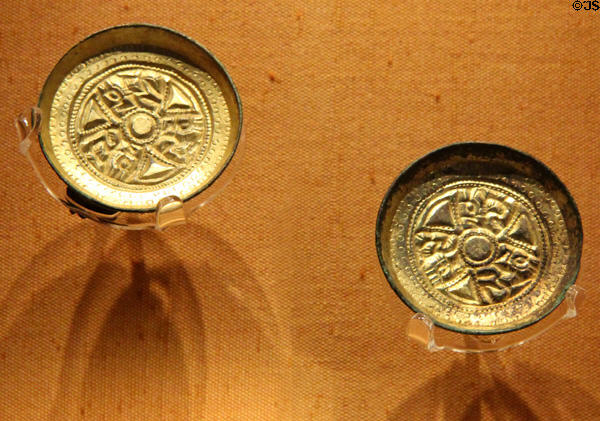 Anglo-Saxon gilded saucer brooches (1st half of 6thC CE) found in grave of child in Lechlade not far from Cirencester at Corinium Museum. Cirencester, England.