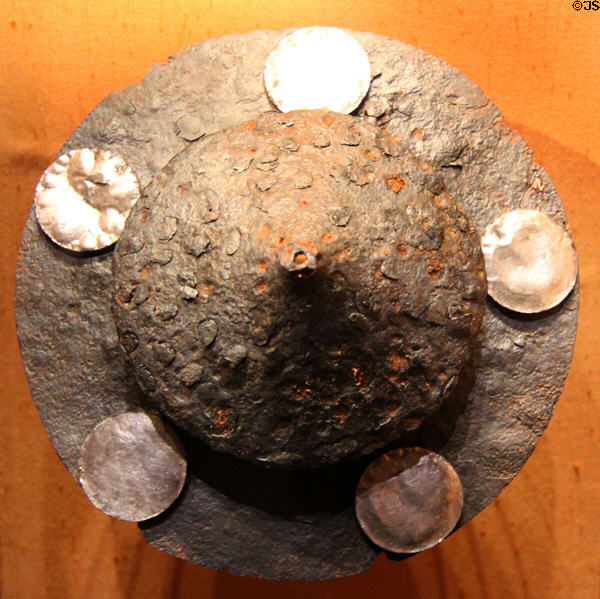 Iron shield boss with silvered rivet-heads (6thC CE) at Corinium Museum. Cirencester, England.