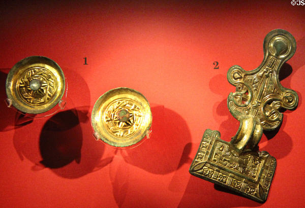 Pair of gilded saucer brooches & "Great square-headed" brooch (6thC CE) found in "Mrs Getty's" grave, Butler's Field Lechlade at Corinium Museum. Cirencester, England.