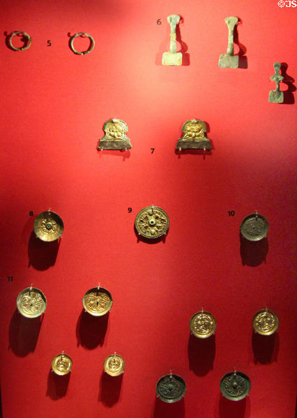 Collection of brooches found in Anglo-Saxon graves at Corinium Museum. Cirencester, England.