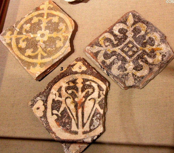 Decorated floor tiles from ruins of St Mary's Abbey (1130-1539) located in Cirencester at Corinium Museum. Cirencester, England.