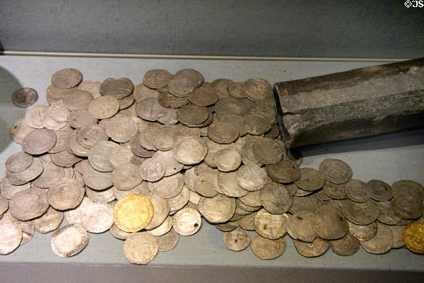 Weston-sub-Edge-Hoard, a Civil War hoard (mid 17thC) of 307 silver & 2 gold coins contained in a specially made pipe beneath floorboards & found in the place for which it is named at Corinium Museum. Cirencester, England.