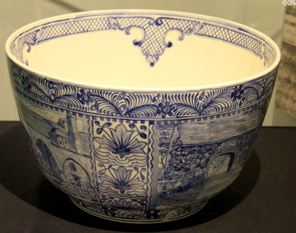 Alfred Powell Bowl (c1920's) made of glazed earthenware & depicting 4 scenes of Cirencester made by Alfred Powell, an Arts & Crafts designer at Corinium Museum. Cirencester, England.
