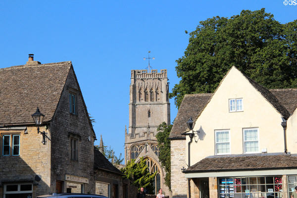Town square with Church of St Peter & St Paul in background. Northleach, England.