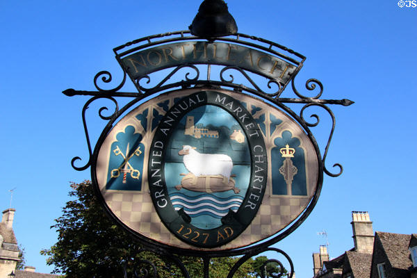 Elaborate wrought iron sign stating that Northleach was granted an Annual Market Charter in 1227. Northleach, England.