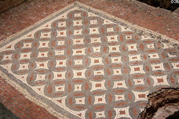 Geometric designs in mosaic floor in warm room (tepidarium) at Chedworth Roman Villa. England.