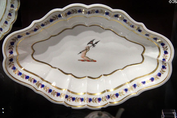 Caughley Porcelain melon shaped dessert dish painted with arm holding ax (c1785-90) at Coalport China Museum. Ironbridge, England.