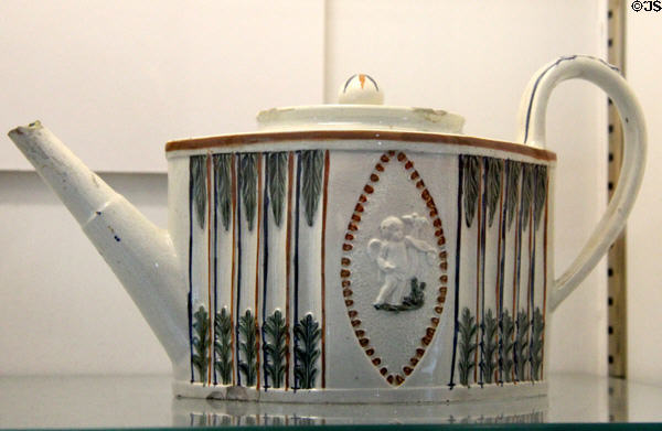Prattware (moulded creamware) (c1780-1840) teapot by Bradley & Co at Coalport China Museum. Ironbridge, England.