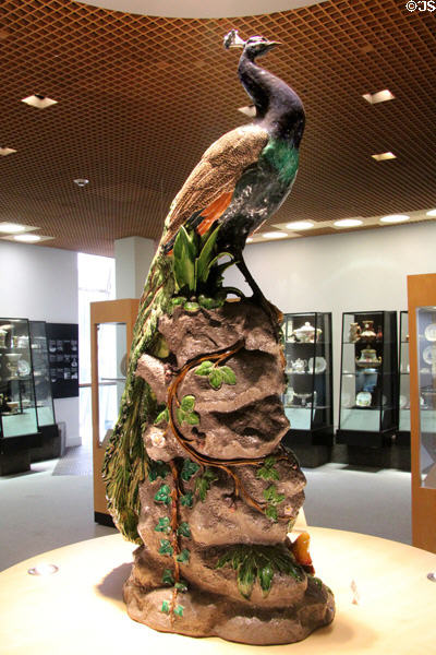 Earthenware life-size peacock shape 2045 (1875) by Paul Comoléra for Minton of Stoke-upon-Trent at Potteries Museum & Art Gallery. Hanley, Stoke-on-Trent, England.