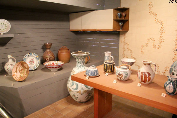 Red earthenware with lustre pigments art pottery (1959-93) by Aldermaston Pottery, Berkshire artists including Alan Caiger-Smith at Potteries Museum & Art Gallery. Hanley, Stoke-on-Trent, England.