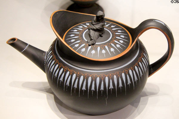 Black Basalt teapot with encaustic enamel (1780-85) by Wedgwood at World of Wedgwood. Barlaston, Stoke, England.