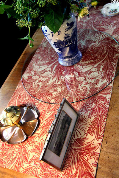 Tulip cloth table runner (1875) by William Morris for Morris & Co in drawing room at Wightwick Manor. Wolverhampton, England.