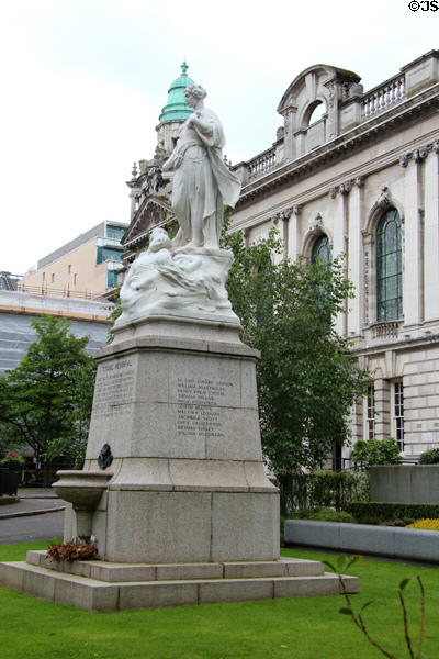 Titanic Memorial sculpture (1920) by Sir Thomas Brock commemorates lives lost in sinking of RMS Titanic on April 15, 1912 on grounds of Belfast City Hall. Belfast, Northern Ireland.