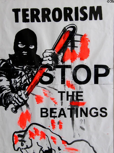 Terrorism Stop the Beatings poster at Linen Hall Library. Belfast, Northern Ireland.