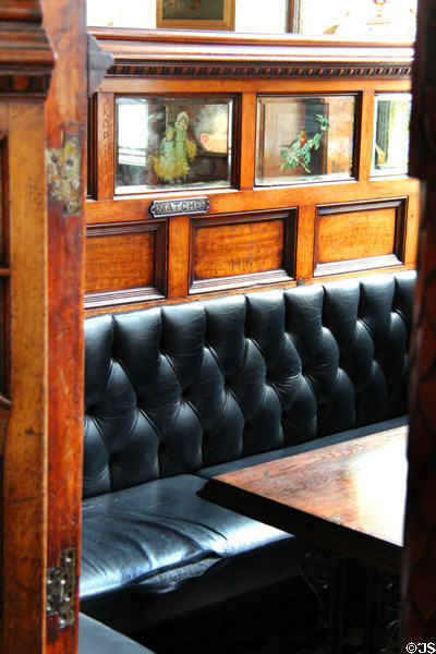 Snug details with iron striking plate on wall for matches at Crown Liquor Saloon. Belfast, Northern Ireland.