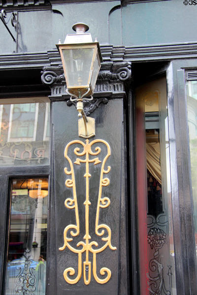 Lamp over decoration on Robinson's building at Crown Liquor Saloon. Belfast, Northern Ireland.