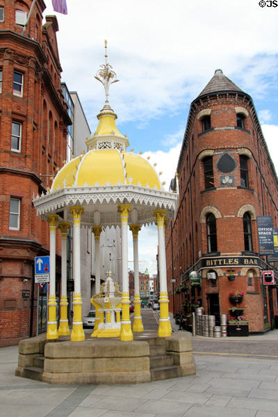 Jaffe drinking fountain (1874) & Flat iron building (1861) at Victoria Square. Belfast, Northern Ireland.