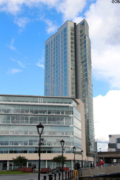 Obel Tower (2006) (62 Donegall Quay) beside Lagan River. Belfast, Northern Ireland. Architect: Broadway Malyan Architects.