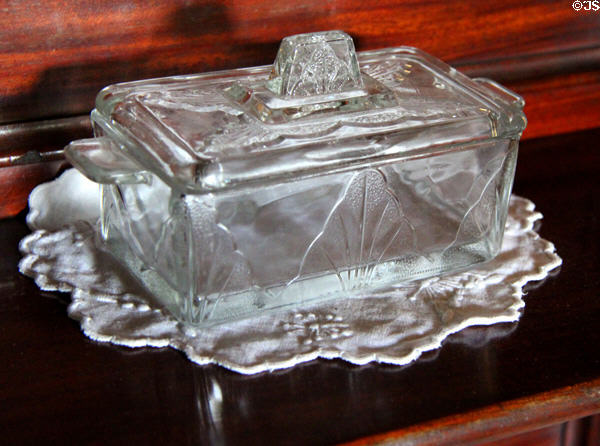 Pressed glass butter dish in Drumnahunshin Farm at Ulster Folk Park. Belfast, Northern Ireland.
