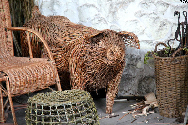 Woven twig pig in Basketmaker's Workshop at Ulster Folk Park. Belfast, Northern Ireland.