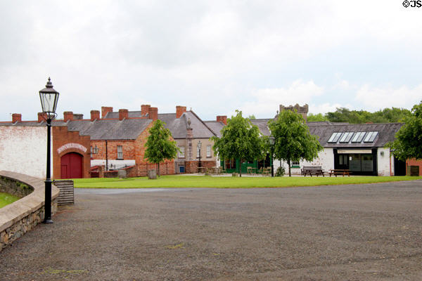 Heritage buildings moved to diamond in Ballycultra town at Ulster Folk Park. Belfast, Northern Ireland.