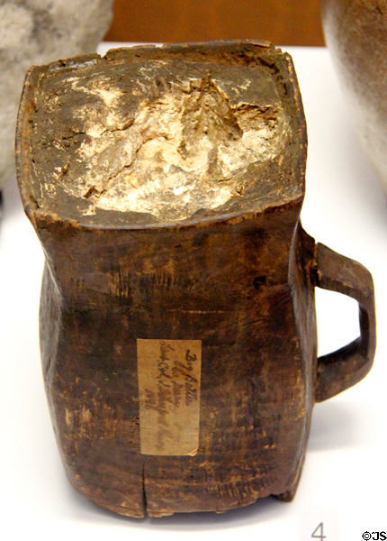Wooden container for butter stored in bogs for concealment & preservation discovered in 1800s at Ulster Museum. Belfast, Northern Ireland.