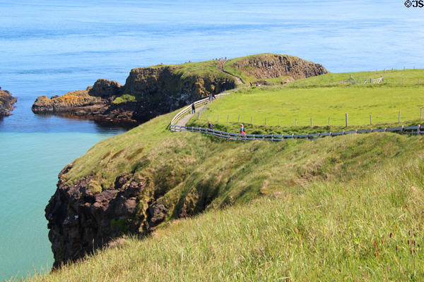 Coastal pathway to Carrick-a-Rede Rope Bridge on Antrim Coast. Northern Ireland.