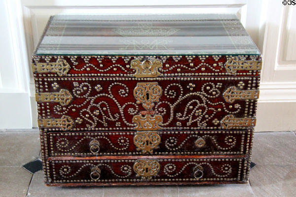 Antique chest (c1700s) decorated with brass plates & nails at Florence Court. Enniskillen, Northern Ireland.