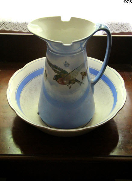 Pitcher & wash basin in weavers cottage at Ulster American Folk Park. Omagh, Northern Ireland.