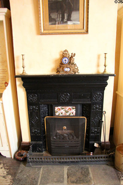 Pub interior fireplace of J Reilly Publican/Grocer at Ulster American Folk Park. Omagh, Northern Ireland.