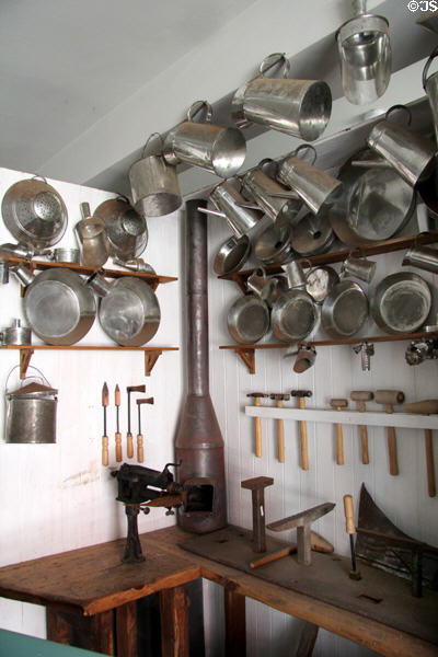 E. Pattison Tinsmith shop with replicas of tinware of Irish emigration era at Ulster American Folk Park. Omagh, Northern Ireland.