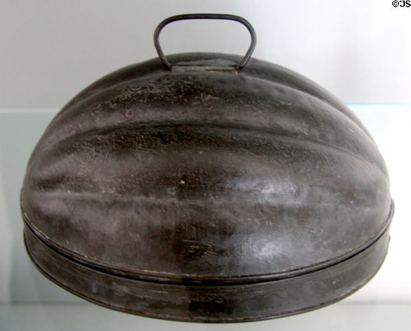 Tin Melon-shaped mould (c1880) from Maryland in E. Pattison Tinsmith shop at Ulster American Folk Park. Omagh, Northern Ireland.