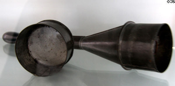 Tin torch (c1890) from Virginia in E. Pattison Tinsmith shop at Ulster American Folk Park. Omagh, Northern Ireland.