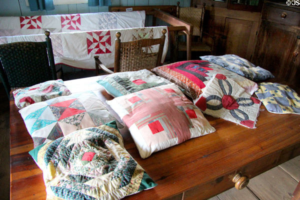 Quilting work area in Western Pennsylvania Log House at Ulster American Folk Park. Omagh, Northern Ireland.