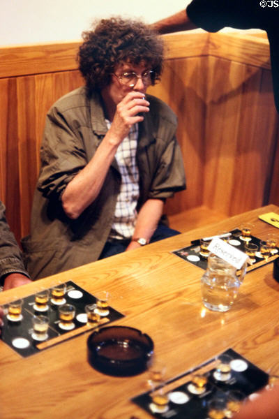 Taste testing whiskey at Old Bushmills Distillery tour. Northern Ireland.