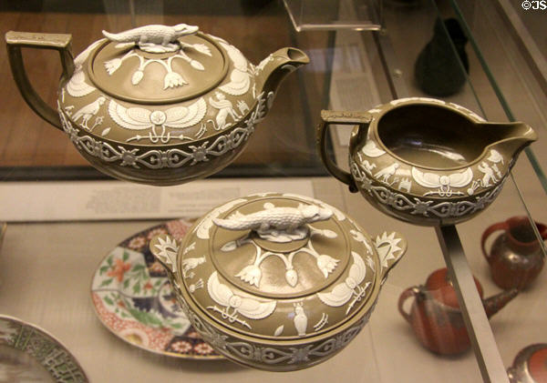 Wedgwood salt-glazed stoneware neo-Egyptian tea set with molded crocodiles, scarabs & lotus flowers (1815-20) at British Museum. London, United Kingdom.