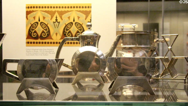 Silver tea set with drum-shaped body (1885) by Christopher Dresser made by Elkington & Co. of Birmingham at British Museum. London, United Kingdom.