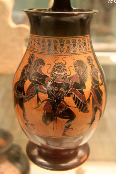 Greek terracotta black figure olpe with Perseus, Hermes & Gorgon (c550-530 BCE) attrib. to Amasis painter made in Athens at British Museum. London, United Kingdom.