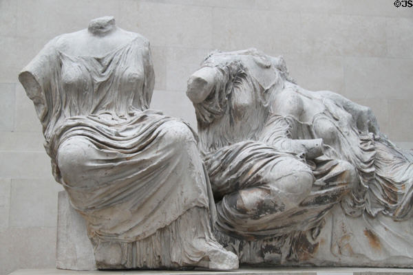 Two seated goddesses (perhaps Hestia & Vesta) on east pediment of Athens Parthenon (447-438 BCE) by Pheidias at British Museum. London, United Kingdom.