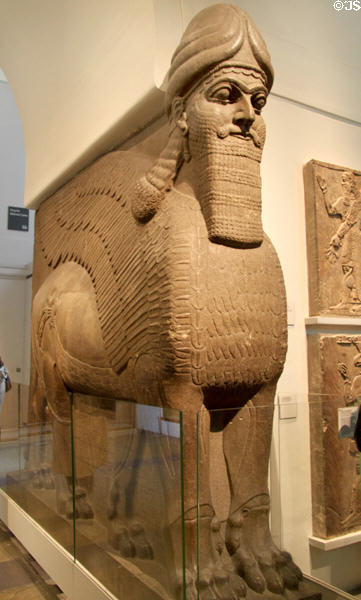 Assyrian human-headed winged lion (c865-860 BCE) guarding doorway of North-West Palace from Nimrud at British Museum. London, United Kingdom.