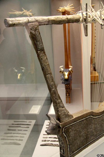 Silver Lyre (c2500 BCE) with reconstructed model beyond from Sumerian city of Ur at British Museum. London, United Kingdom.