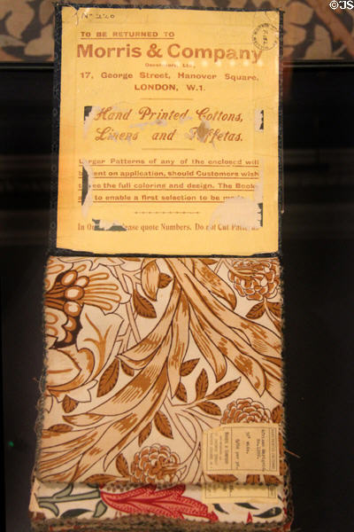 Morris & Co swatch book of hand printed cottons, linens & taffetas (after 1919) with African Marigold pattern showing at Morris Gallery. London, United Kingdom.