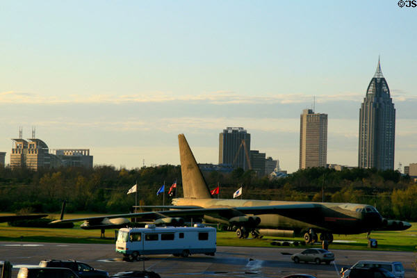 Skyline of mobile over Boeing B-52D Stratofortress from USS Alabama Battleship Memorial Park. Mobile, AL.