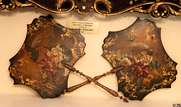 Pair of painted fans at Conde-Charlotte Museum. Mobile, AL.