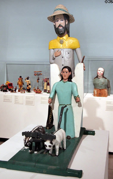 St Isidore the Farmer painted wood sculpture (1990) by Lorenza Bastidas of Venezuela at Tucson Museum of Art. Tucson, AZ.