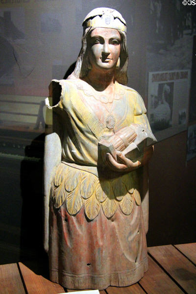 Cigar store female figure in fanciful traditional dress at Arizona Historical Society Museum Downtown. Tucson, AZ.