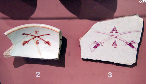 Chinaware fragments with symbols of 6th & 4th U.S. Army Cavalries at Fort Lowell Museum. Tucson, AZ.