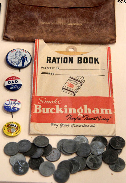 WWII artifacts including ration books, steel pennies & lapel buttons at Pima Air Museum. Tucson, AZ.